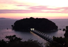 An island with shrines shortly after sunset