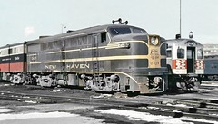 New Haven Railroad ALCO DER-2a class FA-1 locomotive 0429 & DER-2b class FB-1 locomotive 0454 along with a Budd RDC-1 coach 46 is seen in the yard at South Boston, Massachusetts 1958