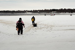 Old Couple Going Ice Fishing