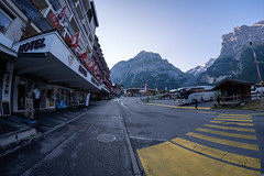 Grindelwald, Switzerland - July 24, 2024: The empty streets of the Swiss Alps village of Grindelwald, early in the morning. Fisheye view