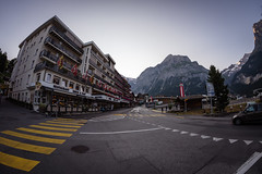 Grindelwald, Switzerland - July 24, 2024: The empty streets of the Swiss Alps village of Grindelwald, early in the morning. Fisheye view