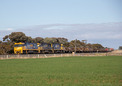 NR85 NR51 and NR89 lean into the curve approaching Dooen with XM4 steel and container train