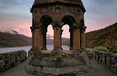 Serene watchtower overlooking the majestic Zhinvali reservoir