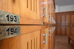 DSC_6896: a row of wooden lockers with numbers on them