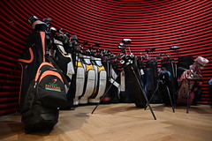 DSC_6890: a room filled with lots of different types of golf bags