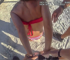 Cuffed at the beach