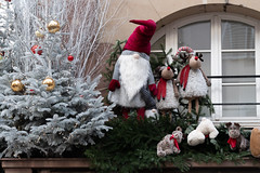 Cute Christmas gnomes and reindeers decorations on buildings in Strasbourg France