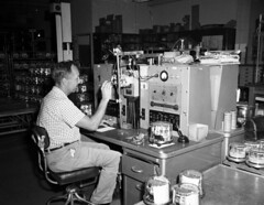 City Light Meter Division employee testing equipment, 1961