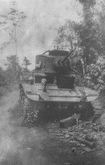 Destroyed Australian M3 Stuart tank at Sanananda, New Guinea