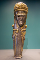 Greave (knee and shin guard) with a female head (full image)