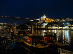 The Dom Luís I Bridge, the monastery and the Douro at night - Porto, Portugal