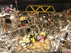 (WIP) Harry’s Trash sci-fi junkyard model featuring minifigures Irena Pinkydot and infant hybrid baby inventor Cray from the LEGO universe a 3d scratch-build in progress modelling art