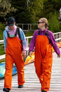Daughter and son with orange jumpsuits on pier 2