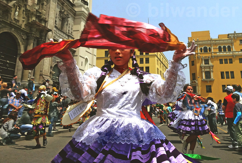 Peru. Lima, Plaza Mayor,  teen girl in fancy dress dancing on Virgin Mary's Nativity feast-day<br/>© <a href="https://flickr.com/people/10416863@N00" target="_blank" rel="nofollow">10416863@N00</a> (<a href="https://flickr.com/photo.gne?id=9739016060" target="_blank" rel="nofollow">Flickr</a>)